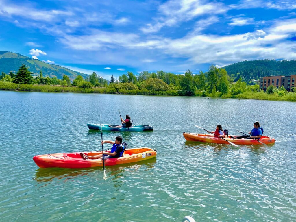 A family renting kayaks in Hood River, Oregon
